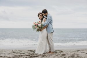 beautiful-husband-wife-posing-beach